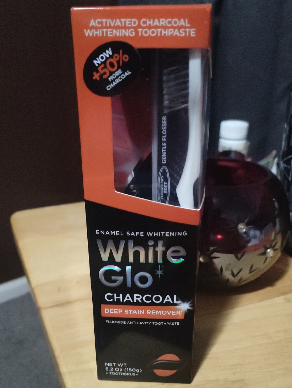 GLO jeans Charcoal Whitening Toothpaste Pack in Black and Orange
